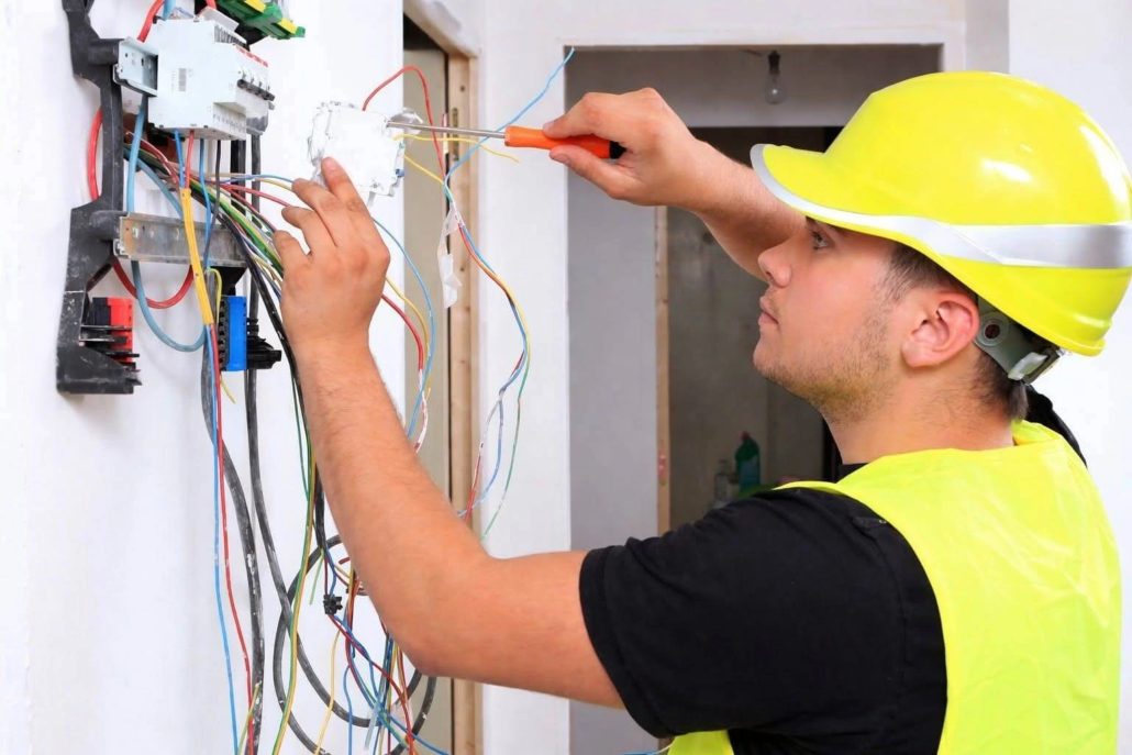 Electrician performing residential electrical troubleshooting and maintenance service for home repair and safety